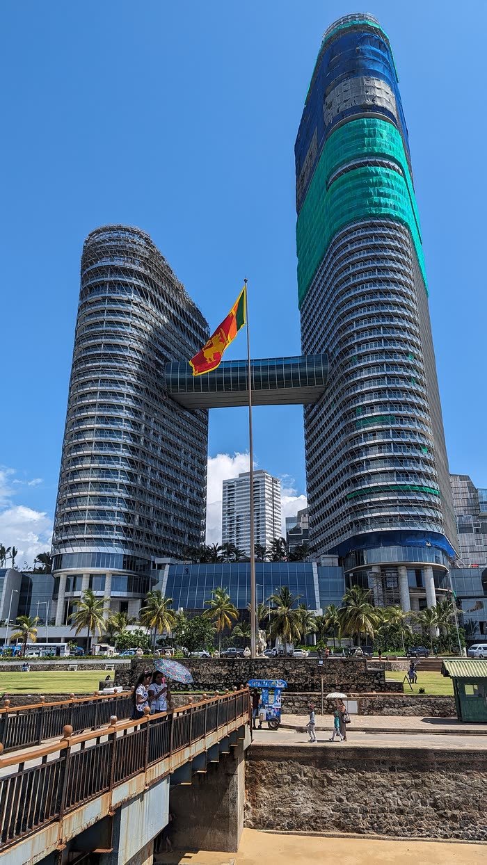 The twin towers of the ITC Ratnadipa hotel on the Colombo seafront, joined by a sky bridge.