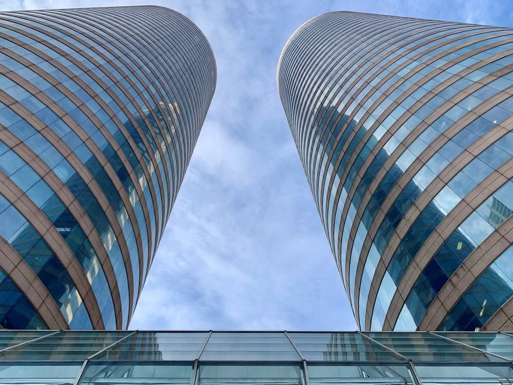 Looking up at the twin glass towers of the World Trade Center, Colombo.